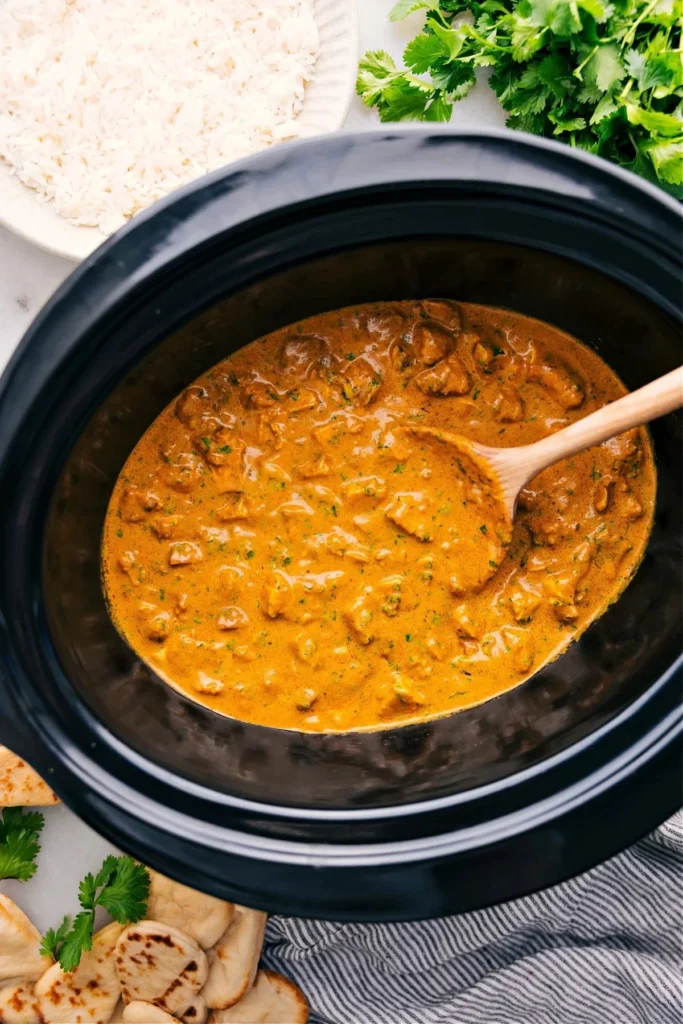 A delicious serving of Crockpot Butter Chicken with creamy sauce and spices