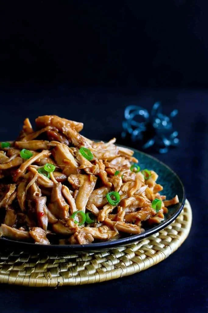 Delicious Slow Cooker Hoisin Chicken served with rice and veggies