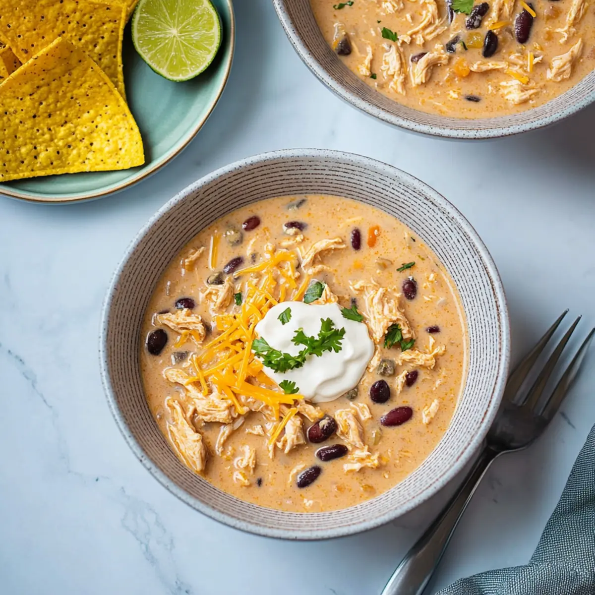 The Easiest Crockpot White Chicken Chili with Cream Cheese (Kid-Friendly Fall Dinner Recipe!)